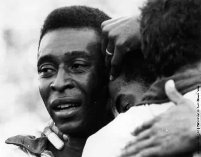 1970: Brazilian soccer star Pele weeps with joy in the arms of his team-mates after Brazil won the FIFA World Cup at the Estadio Azteca in Mexico City, beating Italy 4-1
