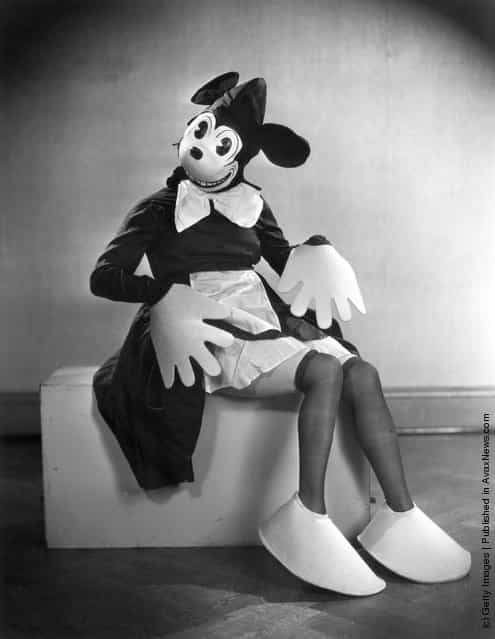 1933: Actress Hermione Baddeley (1906-1986) attends the Film Memories Ball dressed as the Disney character Minnie Mouse