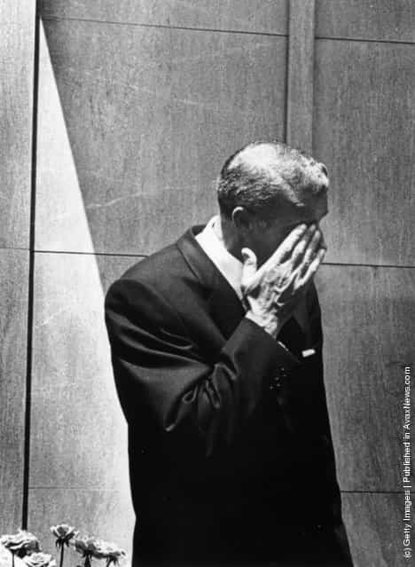 American baseball player Joe DiMaggio (1914 - 1999) wipes a tear from his eye after bursting into tears at the funeral of Marilyn Monroe in Westwood Memorial Park, Hollywood. He was the second of Monroes three husbands