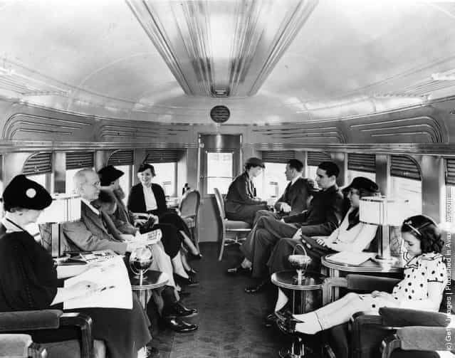Passengers in the spacious lounge car on the new streamlined diesel train Green Diamond, introduced by the Illinois Central System to run fast services between Chicago and Illinois