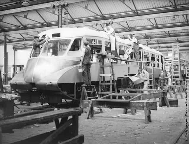 1935: A Great Western Railways streamlined train under construction at the Swindon Works
