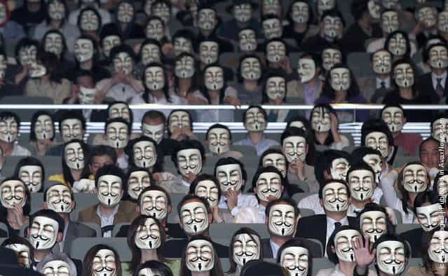 General view of the audience wearing masks during the Japanese premiere of V for Vendetta at Kokusai Forum in Tokyo, Japan