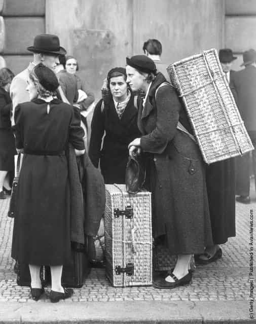 1938: Refugees arriving in Prague after leaving their homes in the Sudetenland, a region with a large ethnic German population, which was the object of German expansionism