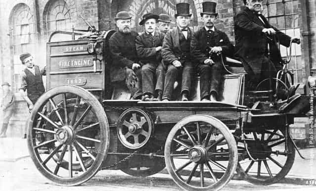 1879: A steam driven Victorian fire engine with crew aboard