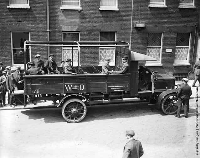 1919: Passengers aboard the new London lorry bus