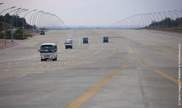 On newly built roads there is very little traffic on the wide 10 lane roads leading to the Parliament complex in Nay Pyi Taw, Myanmar