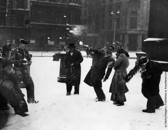 1947: Malayan students enjoying their first snowball fight, in Trafalgar Square, London