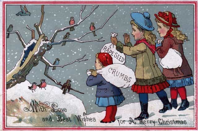 1885: Children feeding the birds in this Victorian Christmas greetings card