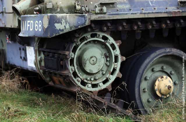 Wrecked tanks are seen close to the road that leads to the village of Imber on Salisbury Plain, England