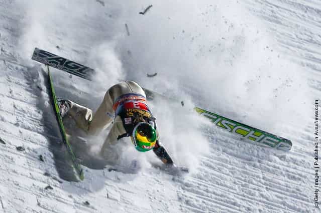 Tom Hilde of Norway crashes during the FIS Ski Jumping World Cup Vierschanzentournee
