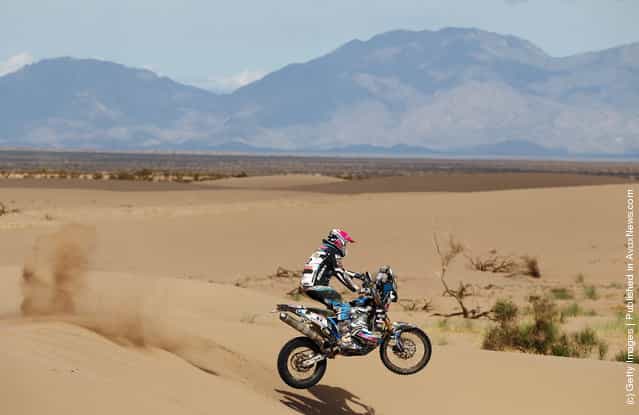 Vincent Guindani of France and Team Vizion Racing in action jumps a sand dune stage five of the 2012 Dakar Rally