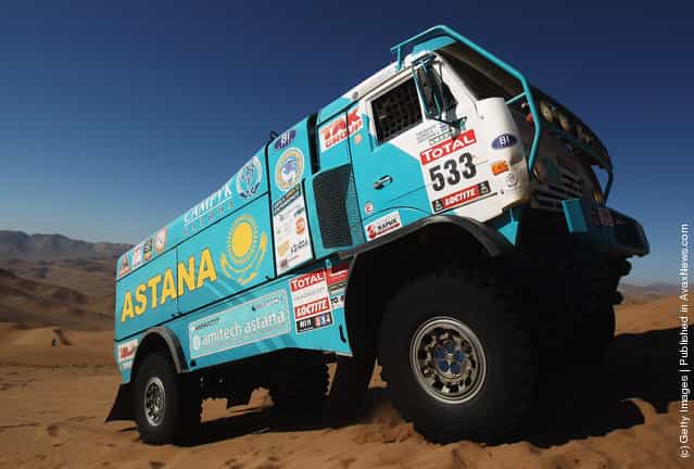Atur Ardavichus of Kazachstan of drives his Kamaz truck over a sand dune during stage seven of the 2012 Dakar Rally