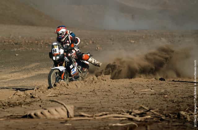 Christophe Blondeau of France and team Franroc struggles in the mud during stage eight of the 2012 Dakar Rally