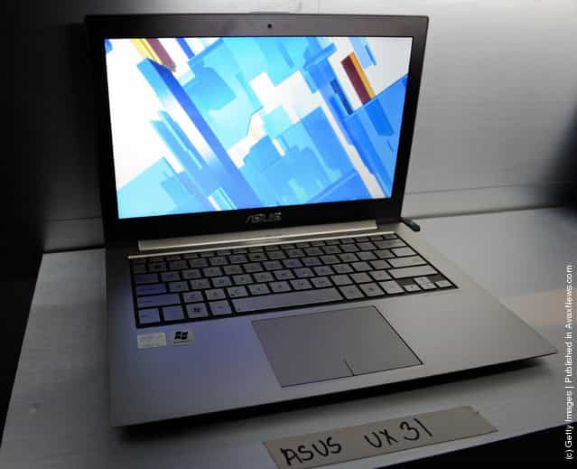 An Asus UX31 Ultrabook is displayed during a press event by Intel Corp. at The Venetian for the 2012 International Consumer Electronics Show
