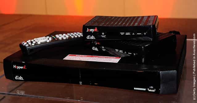 The DISH Hopper HD DVR system, including a pair of companion Joey set-top boxes, are displayed during a press event at The Venetian for the 2012 International Consumer Electronics Show