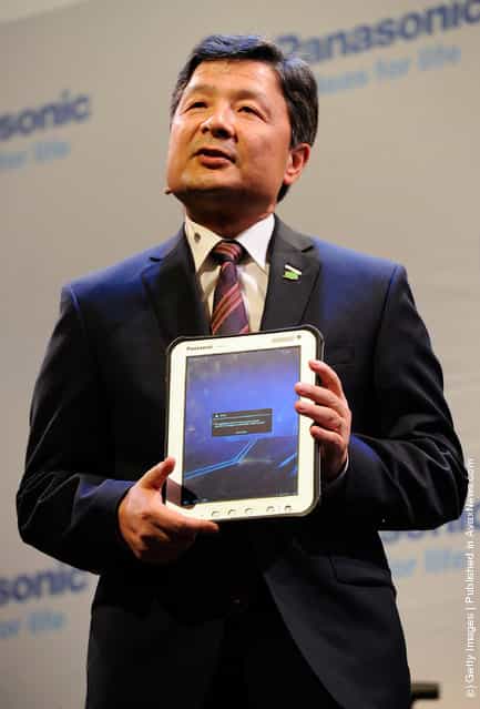President of Panasonic Electronics Marketing Company of North America Shiro Kitajima shows a Panasonic Toughpad