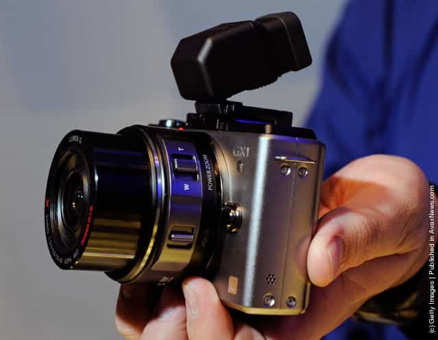 The Lumix GX1 single lens reflex (SLR) camera with 14-42 mm powerzoom lens is displayed at the Panasonic booth at the 2012 International Consumer Electronics Show