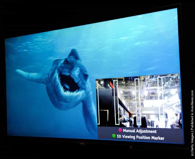 A glasses-free Toshiba 55-inch 3-D 4x full HD TV shows the movie, Sea Rex 3D: Journey to a Prehistoric World at the 2012 International Consumer Electronics Show