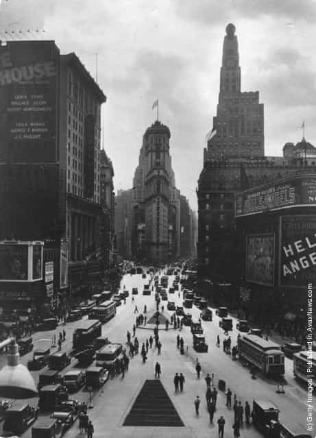 1930: Looking towards the Times Building on Times Square, the Paramount Building is on the right, and Seventh Avenue on the left crossing Broadway