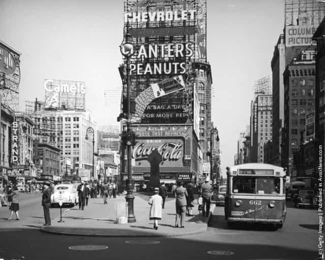 A view of Times Square at the intersection of Broadway and 7th Avenue, New York City, New York, 1941