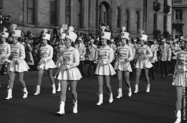 26th November 1961: A group of majorettes parading in the Thanksgiving Parade near Times Square, New York