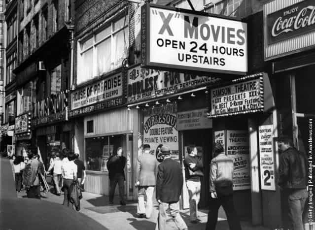 1975: A porn shop with cinema and live shows in New Yorks Times Square area