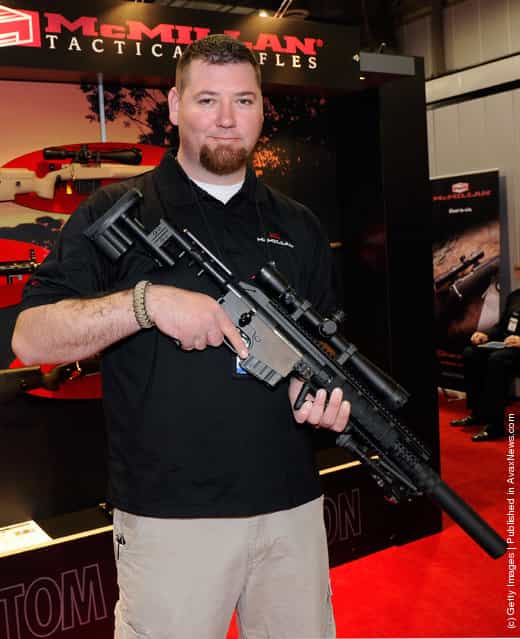 Jack Oliver with McMillan Firearms Manufacturing displays the company's new CS5 bolt action tactical rifle