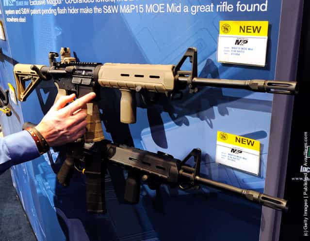 Smith & Wesson M&P15 MOE Mid rifles are displayed at the Smith & Wesson booth