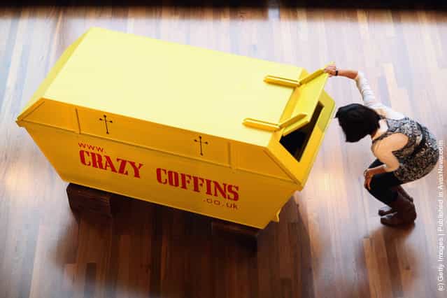 A coffin in the shape of a skip