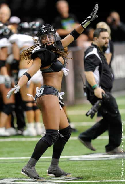 Amber Reed #10 of the Los Angeles Temptation dances on the field late in the teams 28-6 victory over the Philadelphia Passion to win the Lingerie Football Leagues Lingerie Bowl