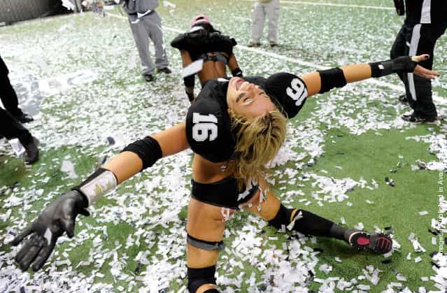 Natalie Jahnke #16 of the Los Angeles Temptation celebrates her teams 28-6 victory over the Philadelphia Passion to win the Lingerie Football Leagues Lingerie Bowl IX at the Orleans Arena
