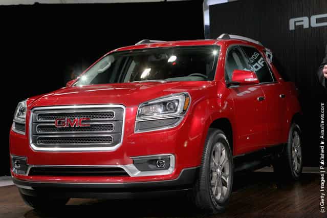 GMC introduces the 2013 Acadia during the media preview of the Chicago Auto Show at McCormick Place