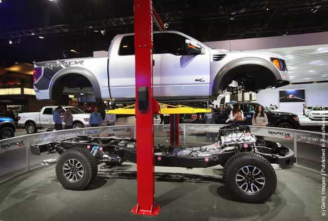 Ford displays the drive train of the F150 Raptor SVT truck during the media preview of the Chicago Auto Show