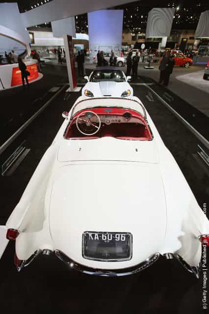 A 1953 Chevrolet Corvette sit nose to nose with a 60th anniversary 2013 Corvette 427 Convertible Collectors Edition during the media preview of the Chicago Auto Show
