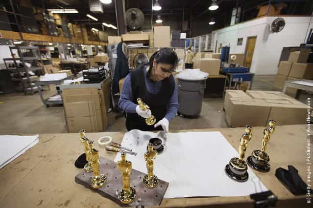 Josefina Govea assembles an Oscar statuette at R.S. Owens & Company
