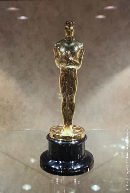 An Oscar statuette sits in a display case at R.S. Owens & Company