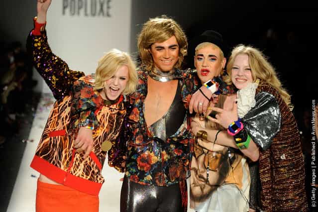 Models and designer Richie Rich (2nd R) walk the runway at the Popluxe Fall 2012 fashion show during Mercedes-Benz Fashion Week