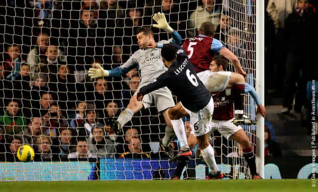 Joleon Lescott of Manchester City scores the opening goal past Shay Given of Aston Villa during the Barclays Premier League match between Aston Villa and Manchester City at Villa Park