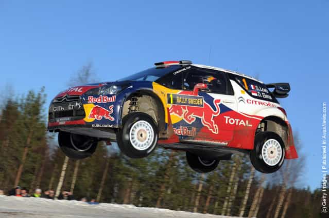 Sebastien Loeb of France and Daniel Elena of Monaco compete in their Citroen Total WRT Citroen DS3 WRC during Day 3 of the WRC Rally Sweden