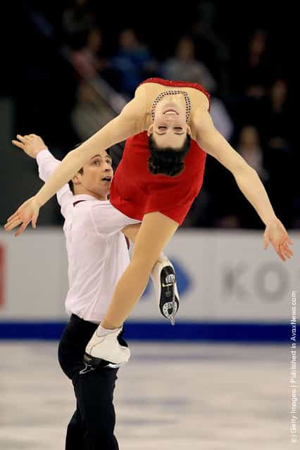 Tessa Virtue and Scott Moir of Canada compete in the Free Dance during the ISU Four Continents Figure Skating Championships at World Arena
