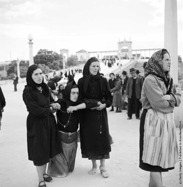 1950: Pilgrims to the Basilica at Fatima, Portugal, will walk the last part of their journey - sometimes on their Knees