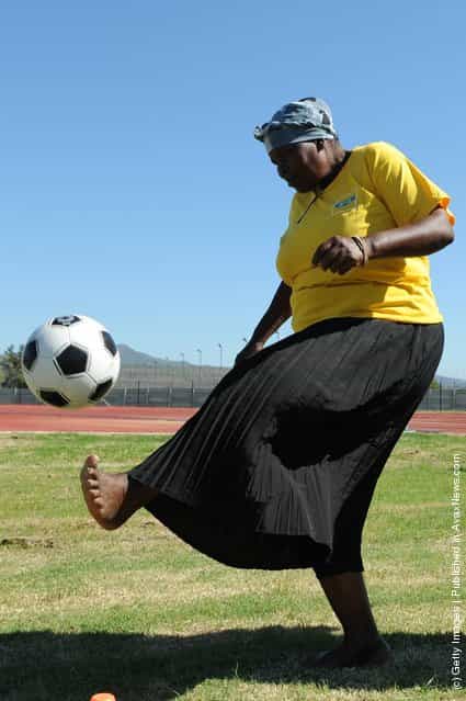 South African grandmothers play football in the Nkowankowa township on November 24, 2009 in Tzaneen, South Africa
