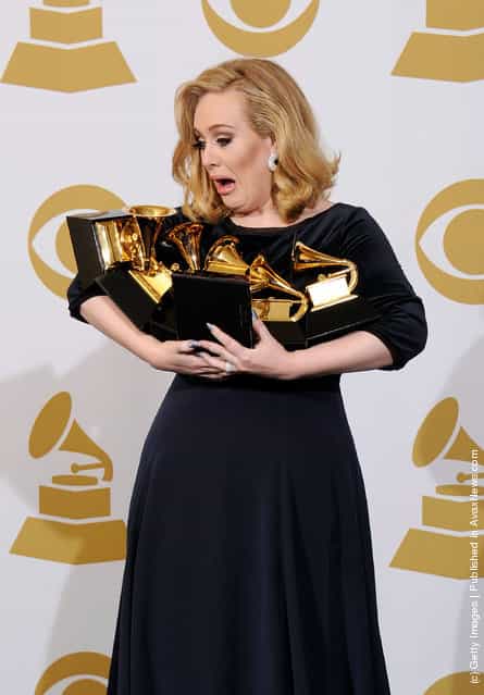 Singer Adele, winner of the GRAMMYs for Record of the Year for 'Rolling In The Deep', Album of the Year for '21', Song of the Year for 'Rolling In The Deep', Best Pop Solo Performance for 'Someone Like You', Best Pop Vocal Album for '21' and Best Short Form Music Video for 'Rolling In The Deep', poses in the press room at the 54th Annual GRAMMY Awards