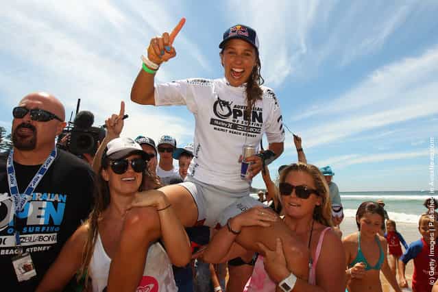Sally Fitzgibbons of Australia celebrates winning the Women's Final of the 2012 Australian Surfing Open