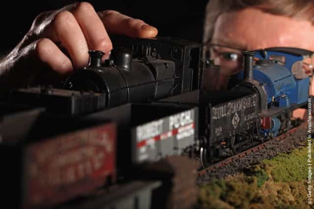 Mike Sant, views his O grade scale layout of Hassell Harbour Bridge as enthusiasts gather for the Rail Scotland exhibition