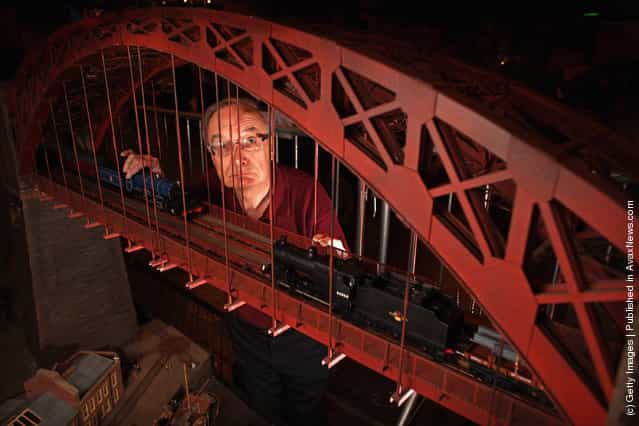 John Gregg, views the O grade scale layout of Hassell Harbour Bridge as enthusiasts gather for the Rail Scotland exhibition