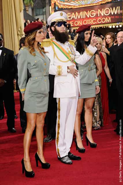 Actor Sacha Baron Cohen, dressed as his character 'General Aladeen,' arrives at the 84th Annual Academy Awards held at the Hollywood & Highland Center