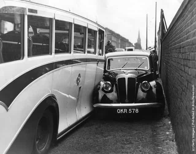 1952: Six holiday-makers were taken to hospital, along with the driver of the coach, after being involved in a triple crash between this car, the coach and another bus in Islington
