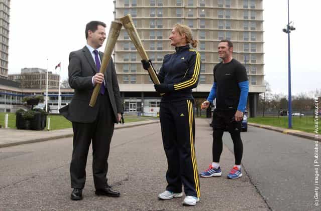 Minister for Crime and Security James Brockenshire watches a training session for the Olympic Torch Security Team who will be protecting the torch bearers and Olympic flame during the torch relays progress through the UK, at the Metropolitan Police Training School