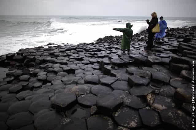 Visitors walk on the Giants Causway in Portrush, Northern Ireland